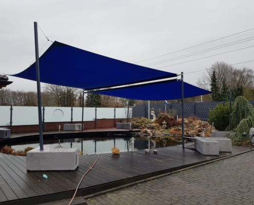 sonnensegel_ber_koiteich_mit_betonfundamenten_meerbusch
